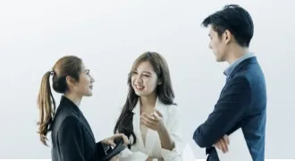 Trinergy team members discussing key strategies