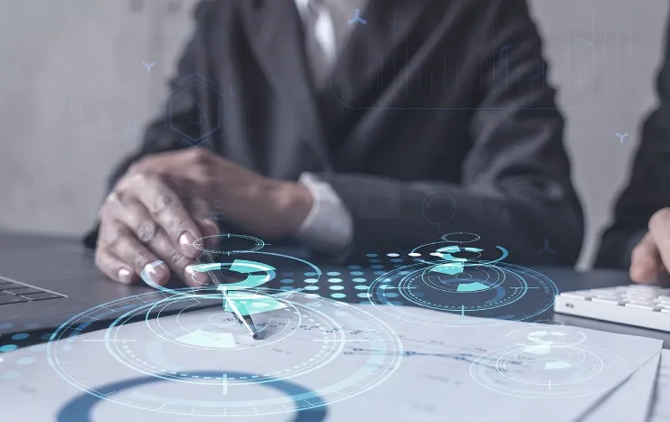 Business professionals analyzing futuristic digital data and strategy plans