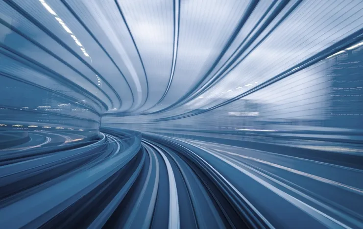 A futuristic, high-speed digital tunnel symbolizing Trinergy's innovative and fast-paced