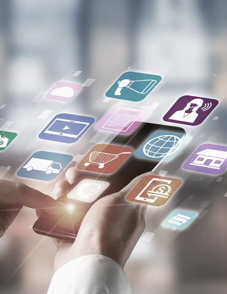 A person using a smartphone with colorful floating app icons