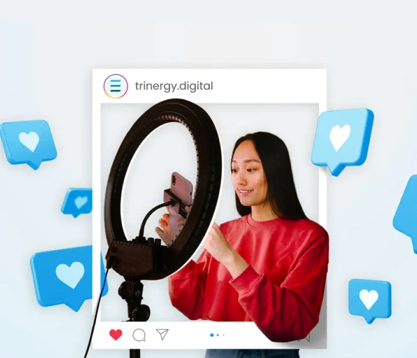 Woman creating social media content with a smartphone and ring light