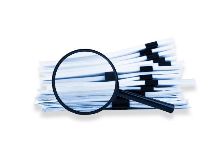 A magnifying glass over a stack of documents symbolizing Trinergy's focus on detailed research
