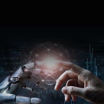 Robotic and human hands reaching toward each other symbolizing AI-human collaboration and innovation.