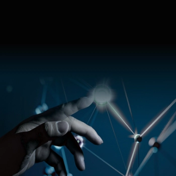 Human hand reaching toward glowing digital nodes on a dark blue technology background
