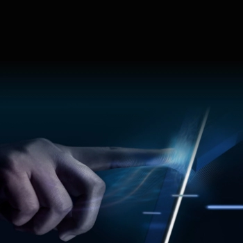 Hand interacting with futuristic digital interface using touch and light trail effect
